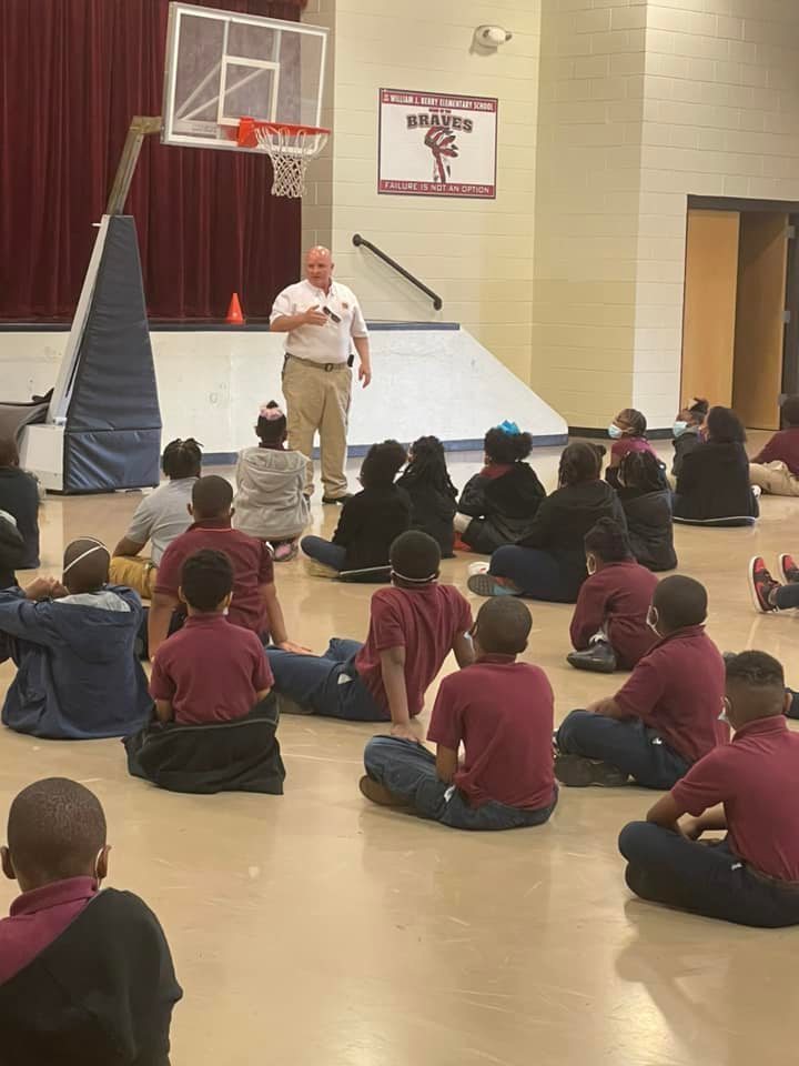 Fire Dept patron presents to students 